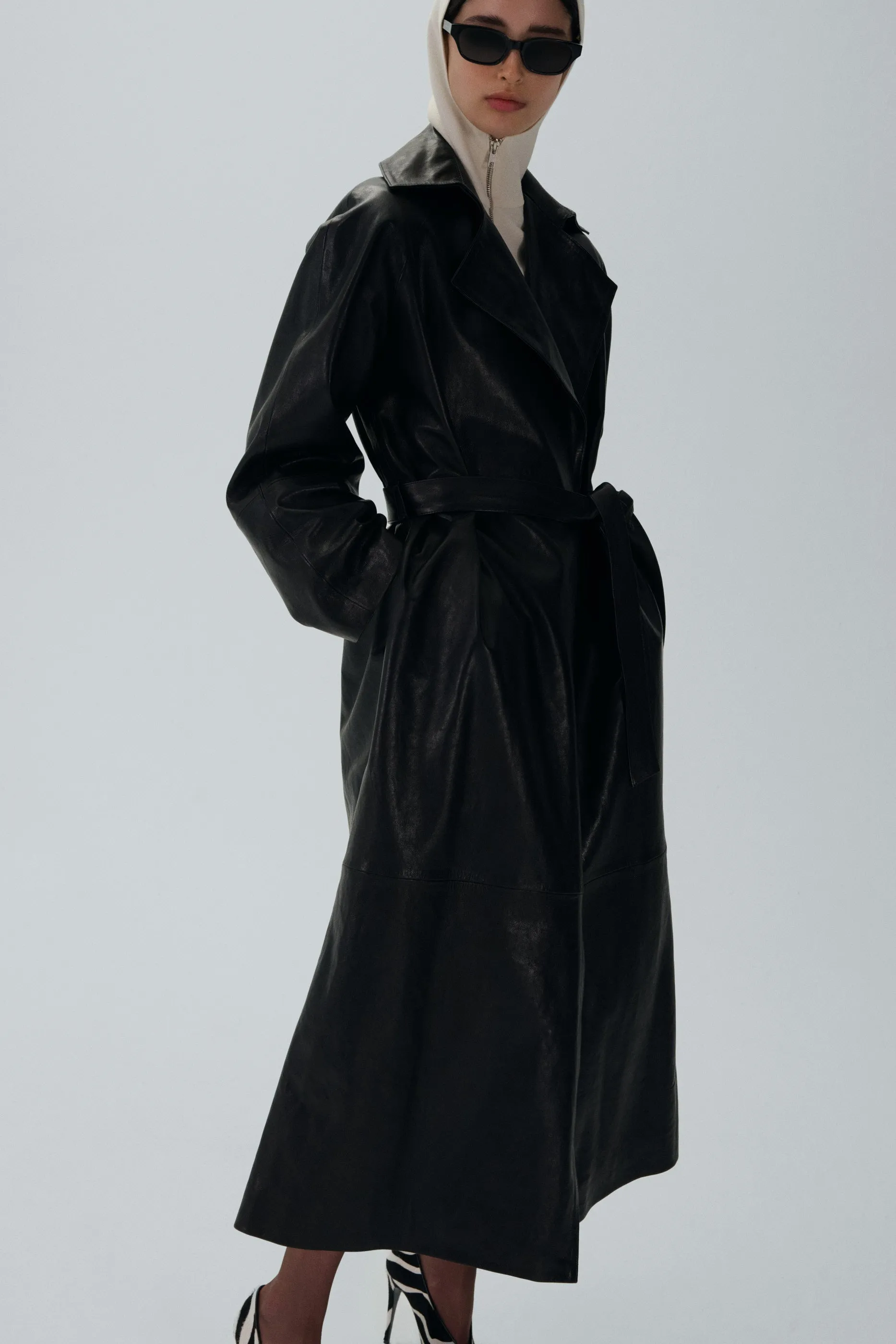 Belted leather wrap coat in black